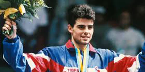 a man celebrating his win in olympics